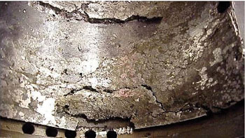 Figure 5. Loss of overlay (Babbitt) material down to the base metal