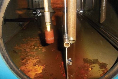 Fig 4: Sludge in a reservoir absorbs heat, which can be difficult to dissipate.