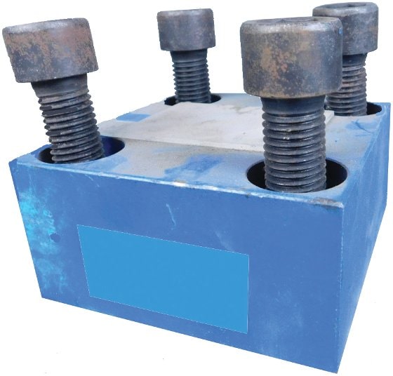 Figure 6. Most logic valves are mounted beneath a cover that's secured by four bolts. Figure 6. Most logic valves are mounted beneath a cover that's secured by four bolts.