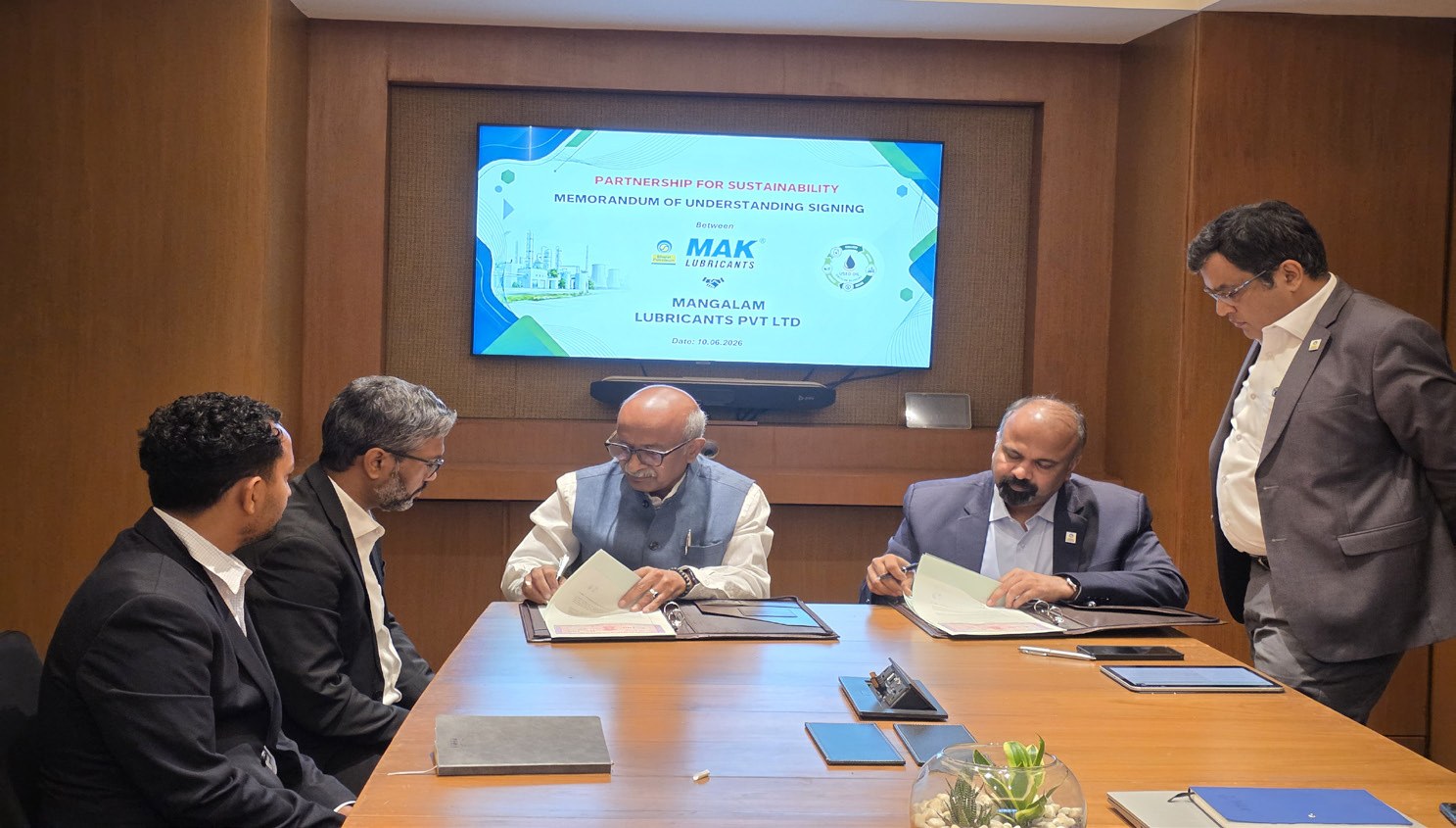 Representatives signing the MAK Lubricants and Mangalam agreement